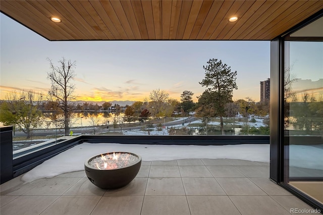 view of patio terrace at dusk