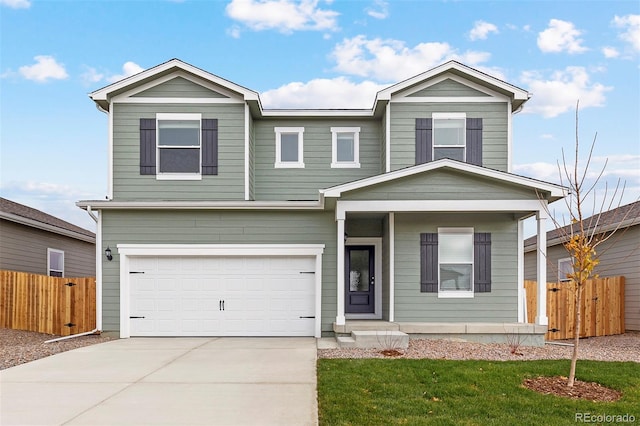 view of front facade with a garage and a front lawn