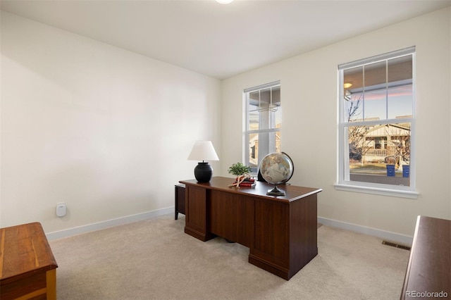 8751 S Wenatchee Ct, Aurora, CO 80016 - office with baseboards, plenty of natural light, and light colored carpet
