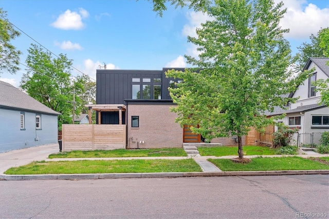 2280 W 42nd Ave, Denver, CO 80211 - view of front of home featuring board and batten siding