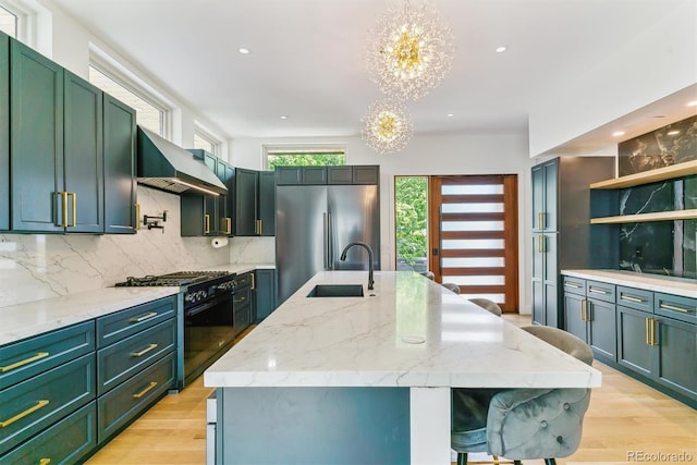 2280 W 42nd Ave, Denver, CO 80211 - kitchen featuring black gas range, exhaust hood, a chandelier, a sink, and high end refrigerator