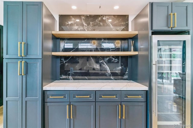 2280 W 42nd Ave, Denver, CO 80211 - detailed view of decorative backsplash, beverage cooler, and recessed lighting