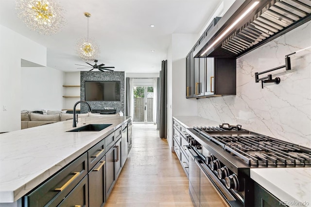 2280 W 42nd Ave, Denver, CO 80211 - kitchen featuring a sink, gas stove, premium range hood, and decorative backsplash