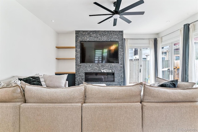 2280 W 42nd Ave, Denver, CO 80211 - living room with ceiling fan and a fireplace