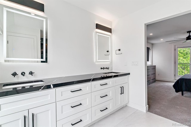 2280 W 42nd Ave, Denver, CO 80211 - ensuite bathroom featuring double vanity, ceiling fan, baseboards, and recessed lighting
