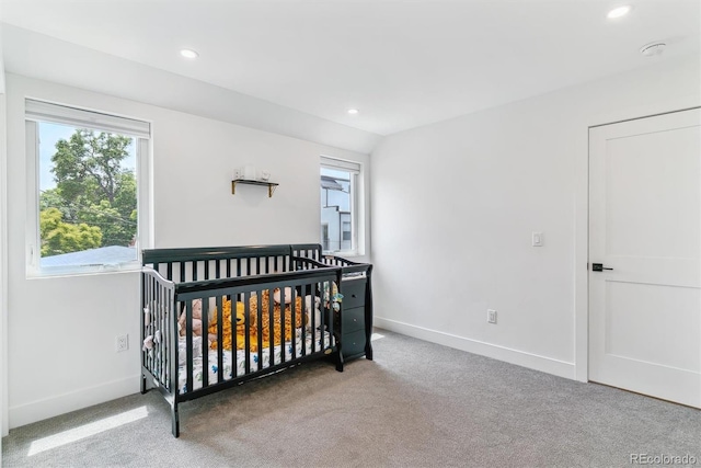 2280 W 42nd Ave, Denver, CO 80211 - bedroom featuring carpet floors, baseboards, recessed lighting, and a crib