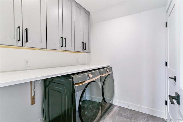 2280 W 42nd Ave, Denver, CO 80211 - laundry room with washer and dryer, cabinet space, and baseboards