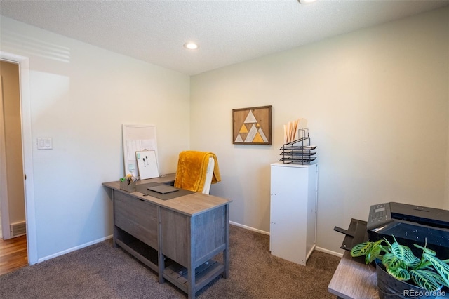 carpeted office space with baseboards and recessed lighting