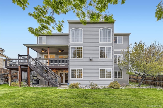 back of property featuring ceiling fan, a wooden deck, stairway, and french doors