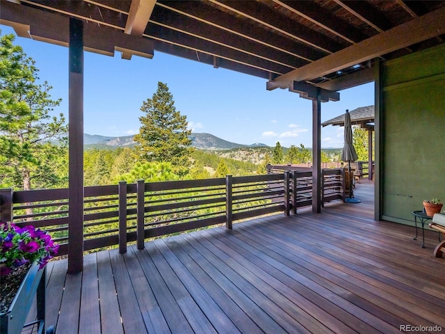 3395 Timbergate Trl, Evergreen, CO 80439 - wooden terrace with a mountain view