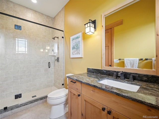3395 Timbergate Trl, Evergreen, CO 80439 - full bathroom with vanity, a shower stall, and tile patterned floors