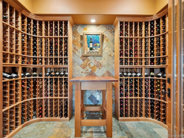 3395 Timbergate Trl, Evergreen, CO 80439 - wine area featuring stone finish flooring
