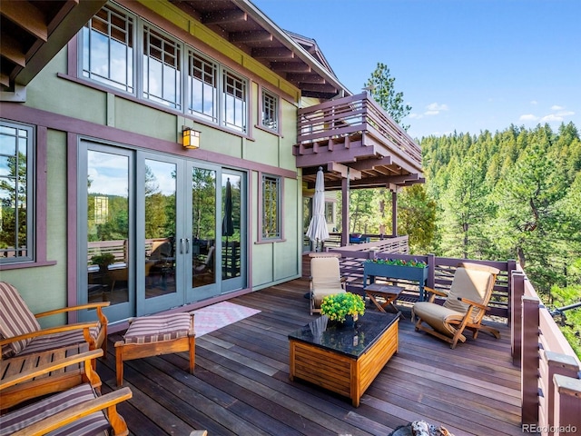 3395 Timbergate Trl, Evergreen, CO 80439 - wooden deck with french doors