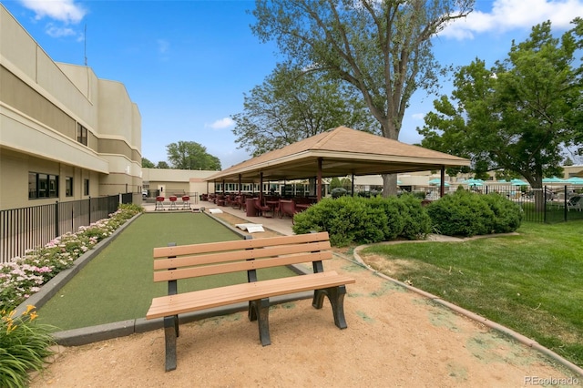 surrounding community featuring a gazebo and a yard