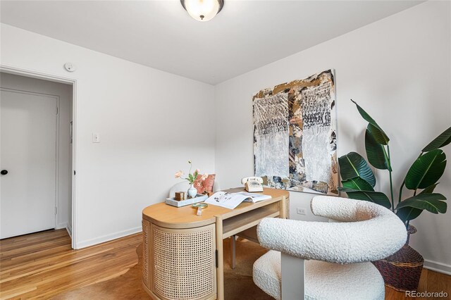 2100 N Franklin St Unit 5, Denver, CO 80205 - home office featuring light wood-style flooring and baseboards