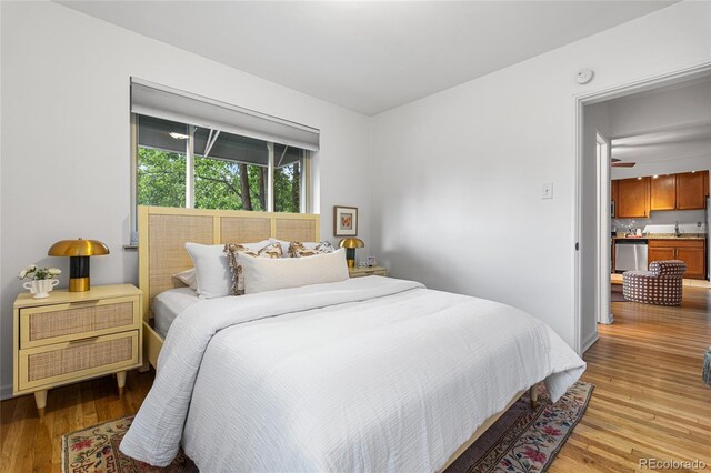 2100 N Franklin St Unit 5, Denver, CO 80205 - bedroom featuring light wood-style flooring