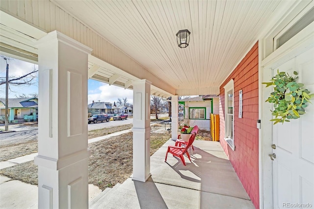 view of patio with a porch and a residential view