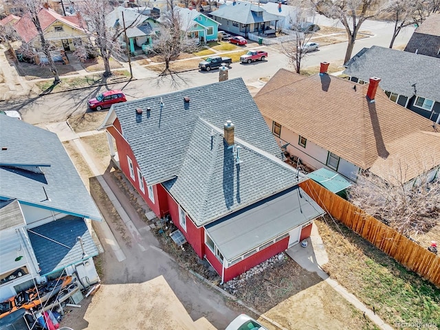 birds eye view of property with a residential view