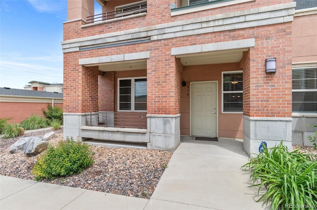4100 Albion St Unit 614, Denver, CO 80216 - view of exterior entry with brick siding