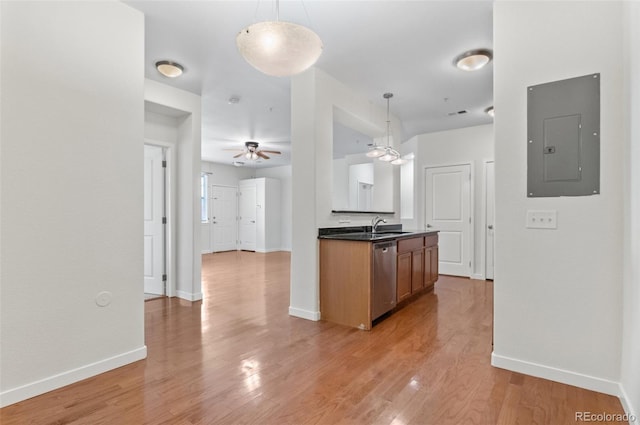 4100 Albion St Unit 614, Denver, CO 80216 - kitchen featuring electric panel, dishwasher, baseboards, and hanging light fixtures