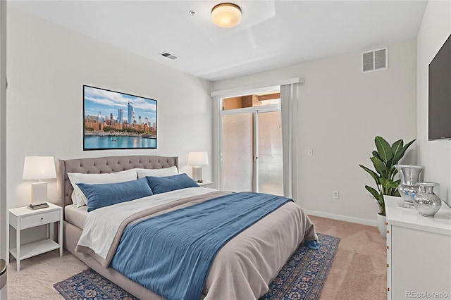 4100 Albion St Unit 614, Denver, CO 80216 - bedroom featuring light colored carpet and baseboards