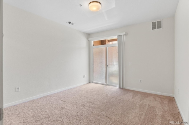 4100 Albion St Unit 614, Denver, CO 80216 - unfurnished bedroom featuring carpet flooring, access to exterior, and baseboards