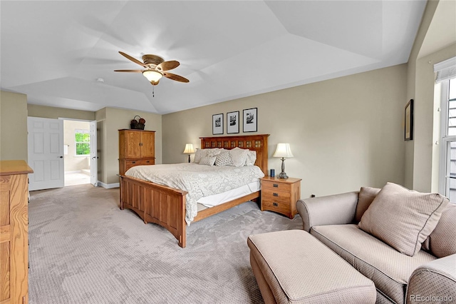 1583 Sunset Ridge Rd, Highlands Ranch, CO 80126 - bedroom featuring light carpet, a tray ceiling, vaulted ceiling, a ceiling fan, and baseboards