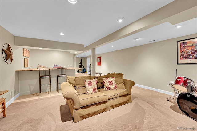 1583 Sunset Ridge Rd, Highlands Ranch, CO 80126 - living room with light colored carpet, recessed lighting, baseboards, and bar area