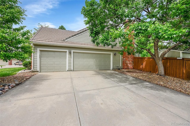 1583 Sunset Ridge Rd, Highlands Ranch, CO 80126 - garage with concrete driveway