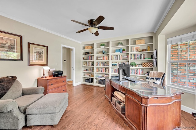 1583 Sunset Ridge Rd, Highlands Ranch, CO 80126 - office space with a ceiling fan, crown molding, wood finished floors, baseboards, and built in features