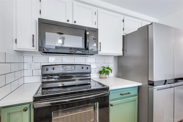 kitchen with black appliances, light countertops, white cabinetry, and decorative backsplash