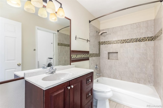 full bath featuring shower / bath combination, vanity, and toilet