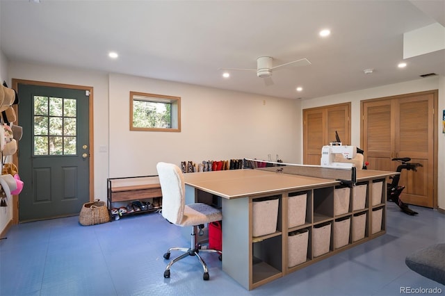 office area with ceiling fan