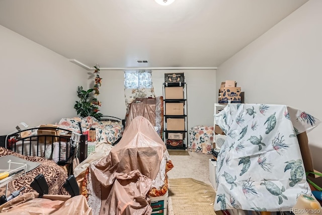 carpeted bedroom with visible vents