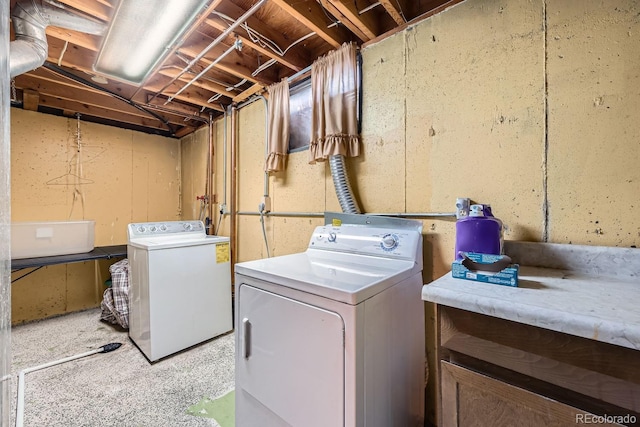 clothes washing area with laundry area and separate washer and dryer