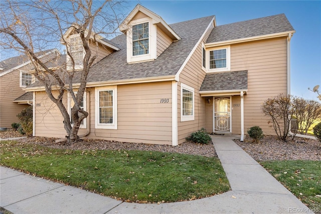 view of front of house featuring a front lawn