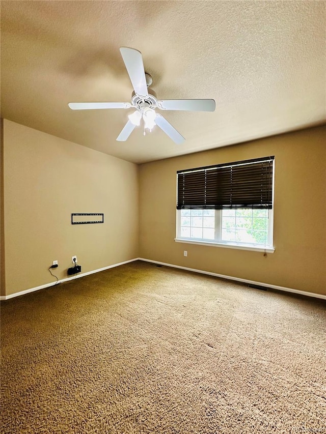 6102 S Yampa St, Aurora, CO 80016 - carpeted empty room featuring a ceiling fan and a textured ceiling