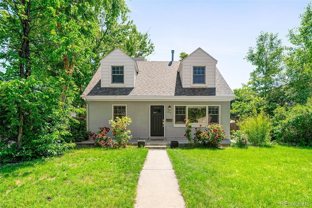 1856 S Monroe St, Denver, CO 80210 - cape cod home featuring a front yard, a shingled roof, and stucco siding