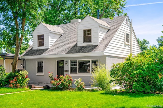 1856 S Monroe St, Denver, CO 80210 - cape cod-style house with roof with shingles, a front yard, stucco siding, and a chimney