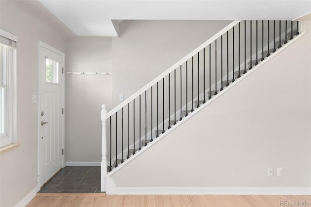 1856 S Monroe St, Denver, CO 80210 - entryway featuring stairway and wood finished floors