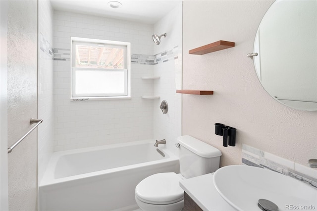 1856 S Monroe St, Denver, CO 80210 - bathroom featuring vanity, tub / shower combination, and a textured wall