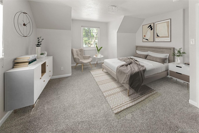 1856 S Monroe St, Denver, CO 80210 - carpeted bedroom with baseboards and lofted ceiling
