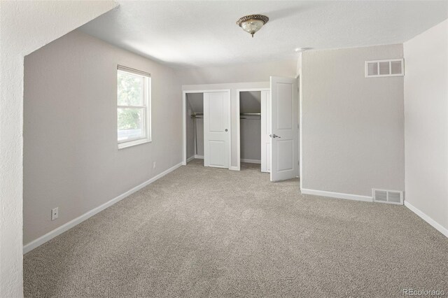 1856 S Monroe St, Denver, CO 80210 - unfurnished bedroom featuring carpet floors