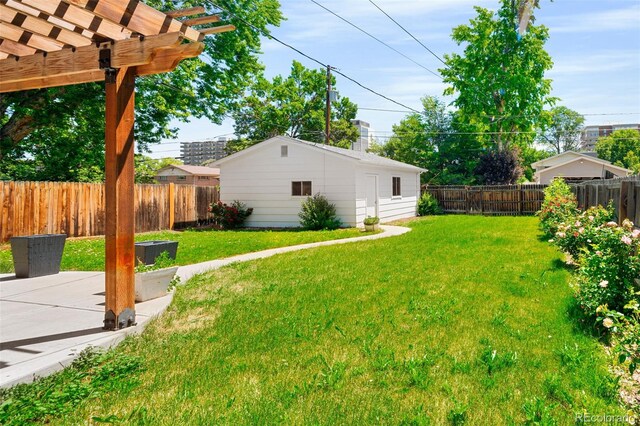 1856 S Monroe St, Denver, CO 80210 - fenced backyard featuring a pergola and a patio