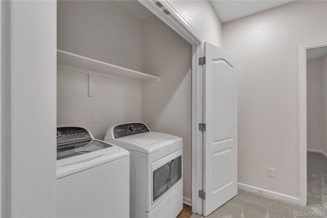 3678 Shadow Cir, Castle Rock, CO 80109 - laundry room featuring washing machine and clothes dryer and light carpet