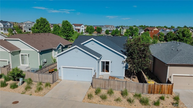 3678 Shadow Cir, Castle Rock, CO 80109 - view of front facade featuring a residential view, driveway, and a garage
