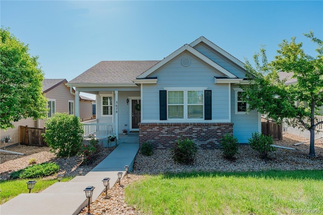 3678 Shadow Cir, Castle Rock, CO 80109 - bungalow-style house with a porch and brick siding