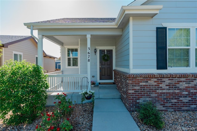 3678 Shadow Cir, Castle Rock, CO 80109 - entrance to property with covered porch and brick siding