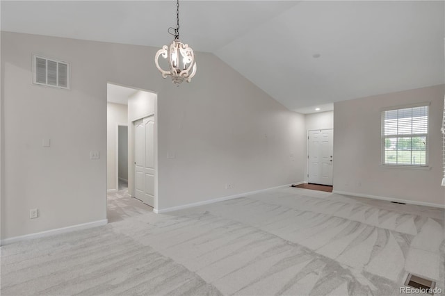 3678 Shadow Cir, Castle Rock, CO 80109 - unfurnished living room featuring vaulted ceiling, light colored carpet, and a chandelier