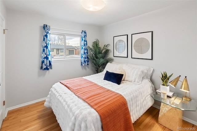 bedroom featuring hardwood / wood-style floors